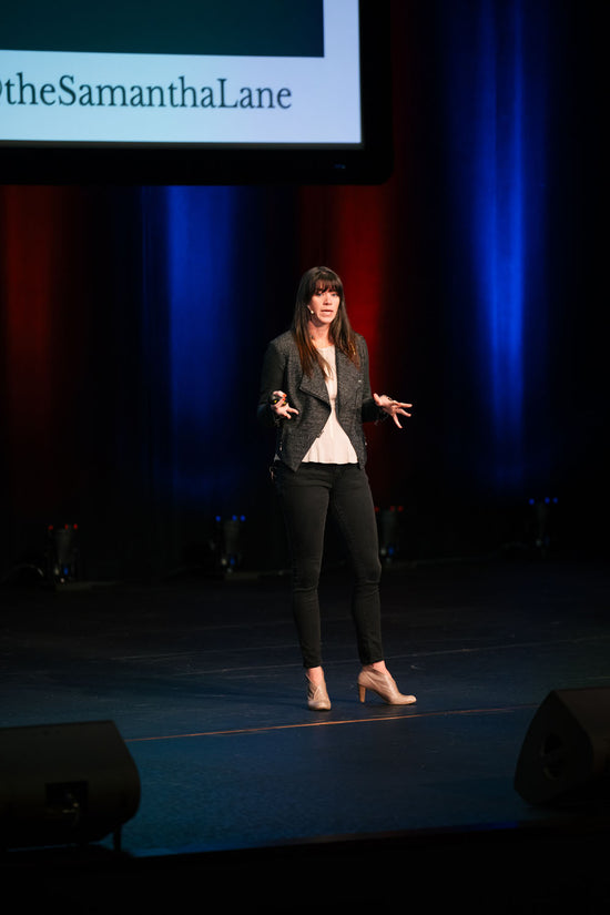 Samantha Lane speaking on stage