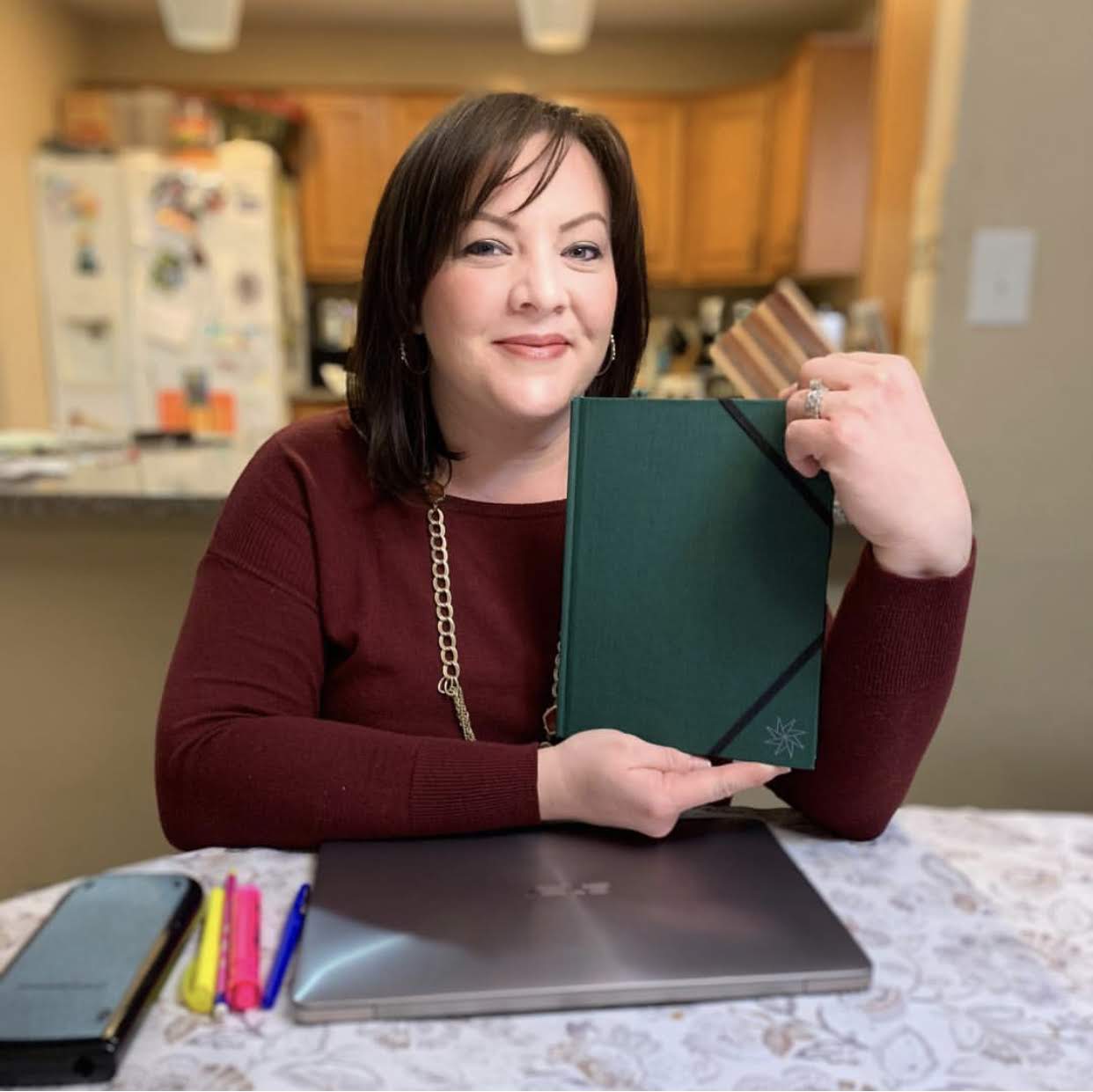 Female Origami Day Client holding Origami day Time Management Planner and Tools